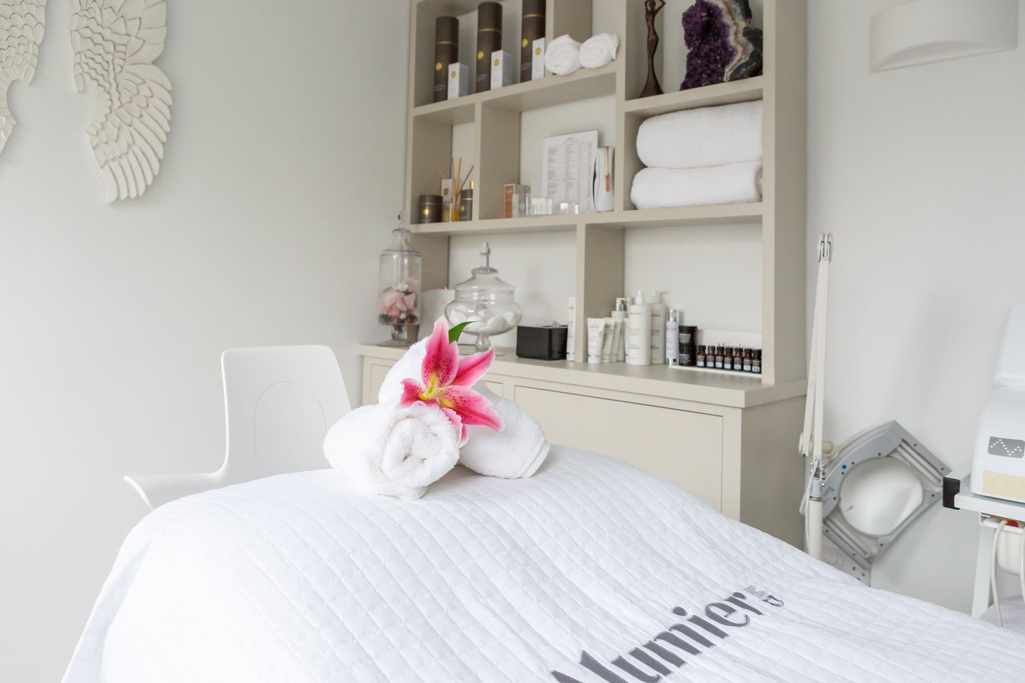 Caroline Conrad Treatment Bed with display cabinet in background